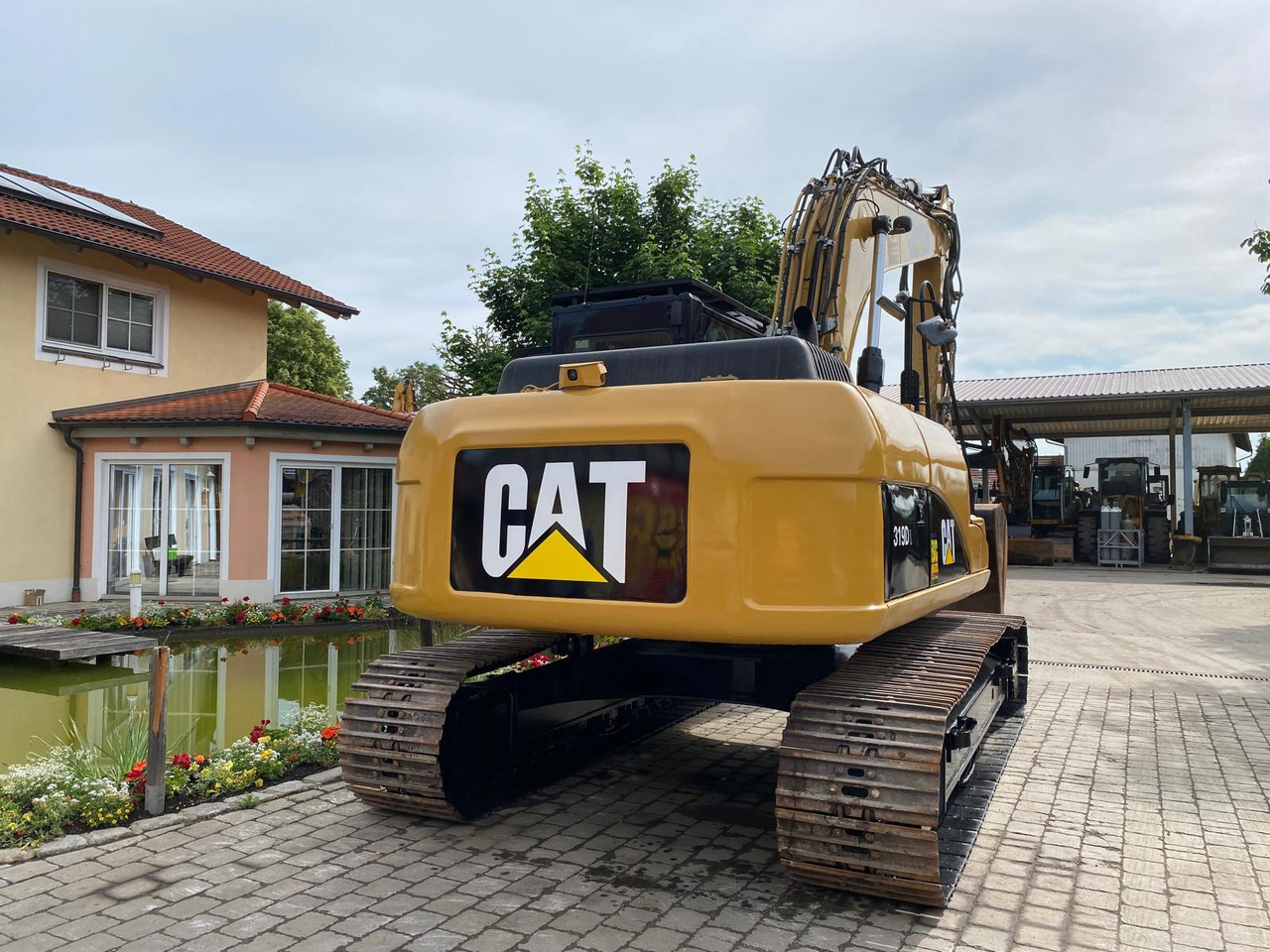 Máy xúc bánh xích Caterpillar 319D: hình 7