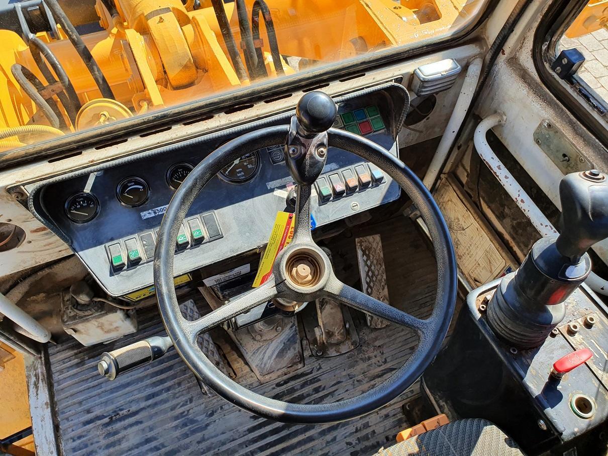 Liebherr L 521 - Máy xúc lật bánh lốp: hình 3 Liebherr L 521 - Máy xúc lật bánh lốp: hình 3