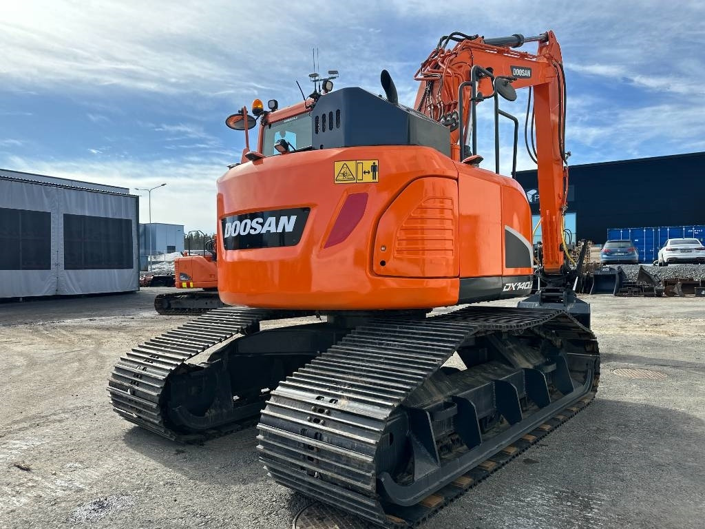 Doosan DX 140 LCR-5 metsäalusta - Máy xúc bánh xích: hình 4 Doosan DX 140 LCR-5 metsäalusta - Máy xúc bánh xích: hình 4