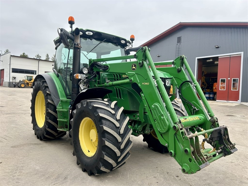 John Deere 6125 R AUTOPOWER ETUKUORMAAJALLA  - Máy cày: hình 4 John Deere 6125 R AUTOPOWER ETUKUORMAAJALLA  - Máy cày: hình 4