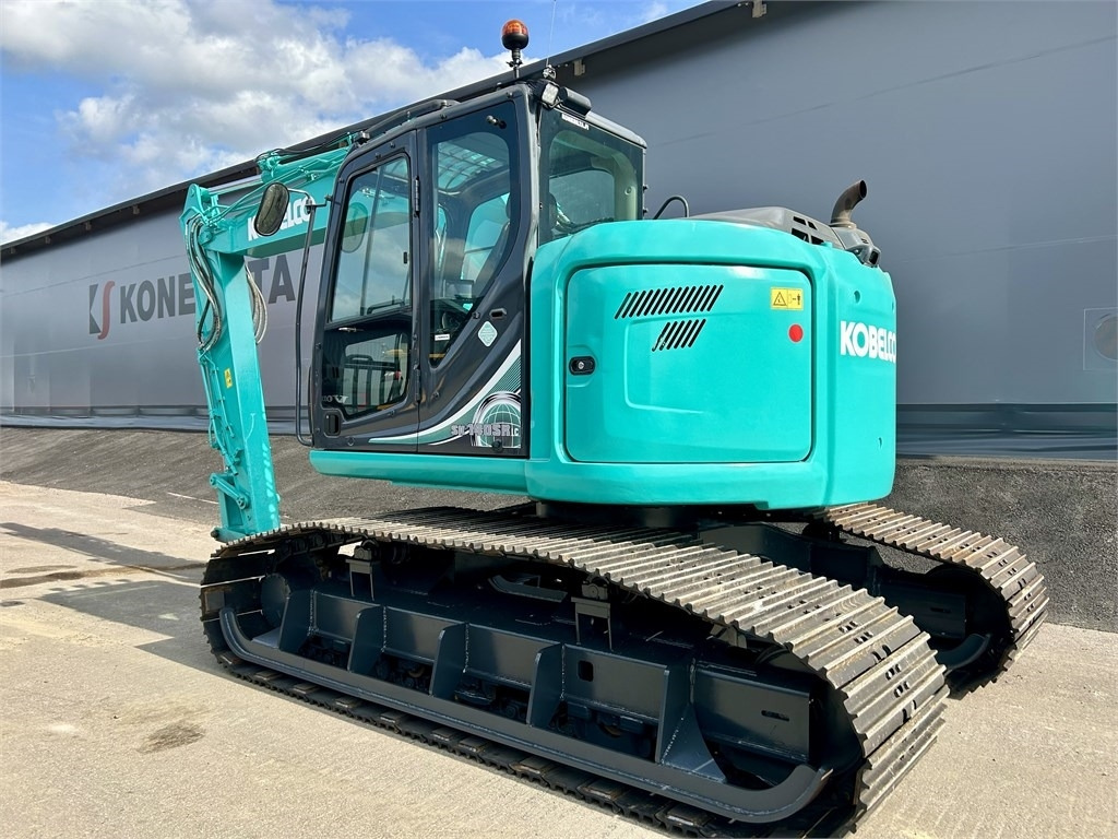 Kobelco SK140SRL-5 JATKETTU SUOALUSTA TULOSSA - Máy xúc bánh xích: hình 2 Kobelco SK140SRL-5 JATKETTU SUOALUSTA TULOSSA - Máy xúc bánh xích: hình 2