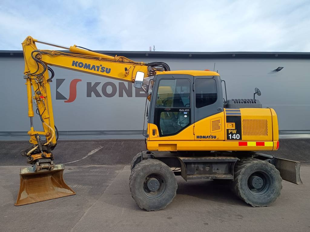 Komatsu PW140-7 PYÖRITTÄJÄLLÄ - Máy xúc bánh lốp: hình 1 Komatsu PW140-7 PYÖRITTÄJÄLLÄ - Máy xúc bánh lốp: hình 1