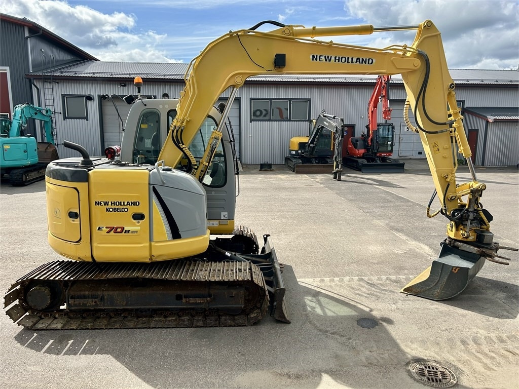 New Holland E 70BSR 2D MITTALAITTEET - Máy xúc mini: hình 5 New Holland E 70BSR 2D MITTALAITTEET - Máy xúc mini: hình 5