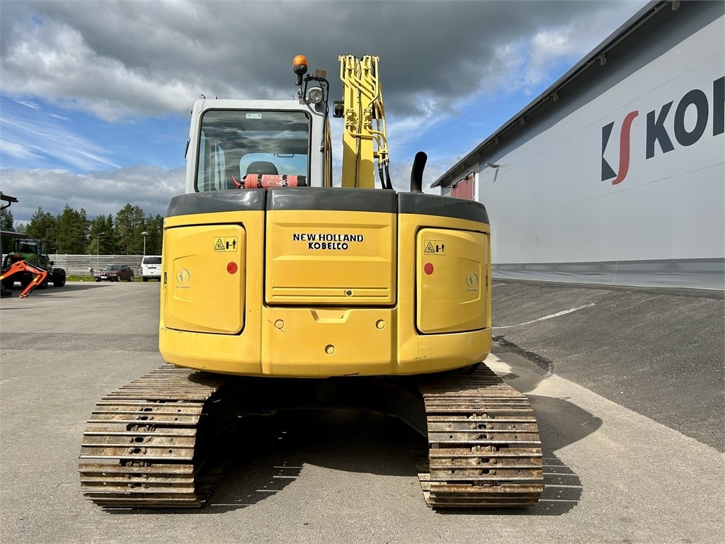 New Holland E 70BSR 2D MITTALAITTEET - Máy xúc mini: hình 3 New Holland E 70BSR 2D MITTALAITTEET - Máy xúc mini: hình 3