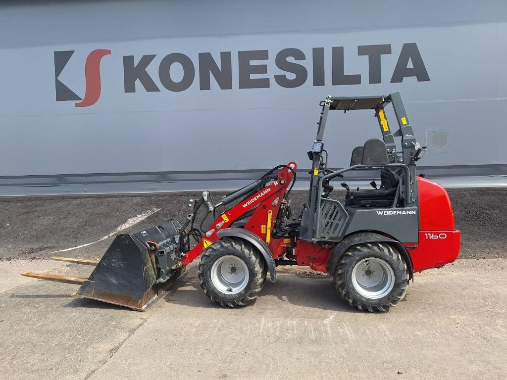 Weidemann MYYTY!SOLD! 1160 VÄHÄN AJETTU, KAUHA+PIIKIT - Máy xúc lật mini gấp khúc: hình 1 Weidemann MYYTY!SOLD! 1160 VÄHÄN AJETTU, KAUHA+PIIKIT - Máy xúc lật mini gấp khúc: hình 1