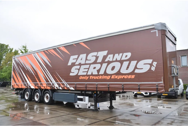 Fruehauf SLIDING CURTAINS/ROOF - TOPLIFT SYSTEM - LIFT AXLE - STEERING AXLE - SAF AXLES - ALCOA'S - DHOLLANDIA - TOP CONDITION - - Sơ mi rơ moóc mui bạt: hình 1 Fruehauf SLIDING CURTAINS/ROOF - TOPLIFT SYSTEM - LIFT AXLE - STEERING AXLE - SAF AXLES - ALCOA'S - DHOLLANDIA - TOP CONDITION - - Sơ mi rơ moóc mui bạt: hình 1