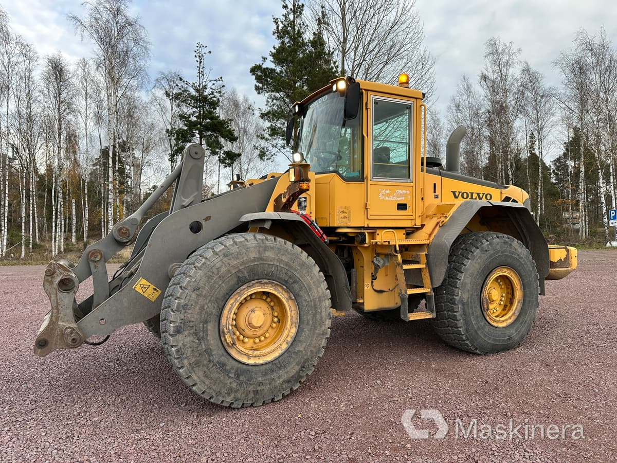 Hjullastare Volvo L110E - Máy xúc lật bánh lốp: hình 1 Hjullastare Volvo L110E - Máy xúc lật bánh lốp: hình 1