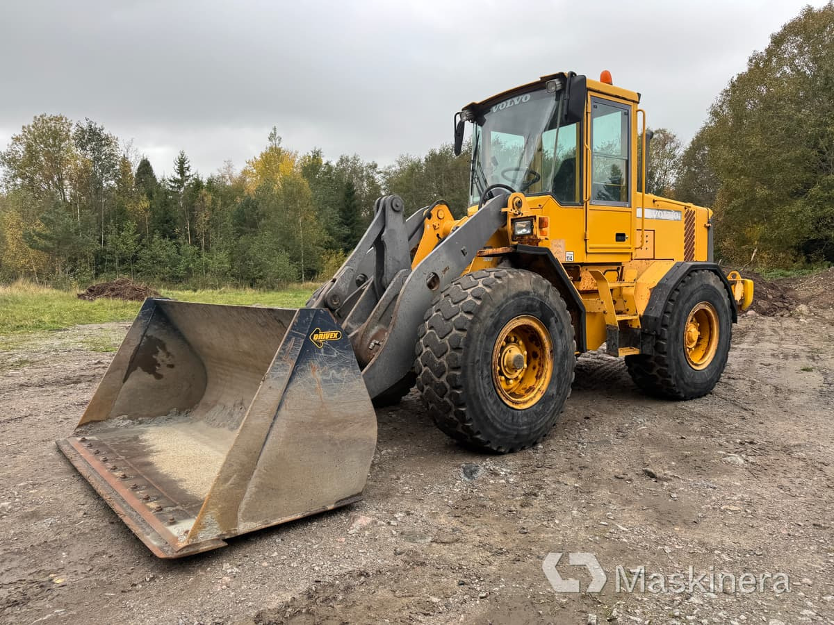 Hjullastare Volvo L70D - Máy xúc lật bánh lốp: hình 1 Hjullastare Volvo L70D - Máy xúc lật bánh lốp: hình 1