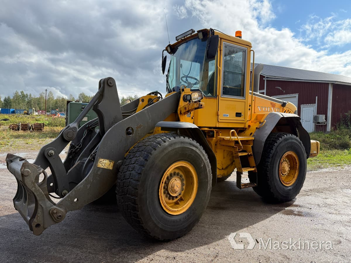 Hjullastare Volvo L70E - Máy xúc lật bánh lốp: hình 1 Hjullastare Volvo L70E - Máy xúc lật bánh lốp: hình 1
