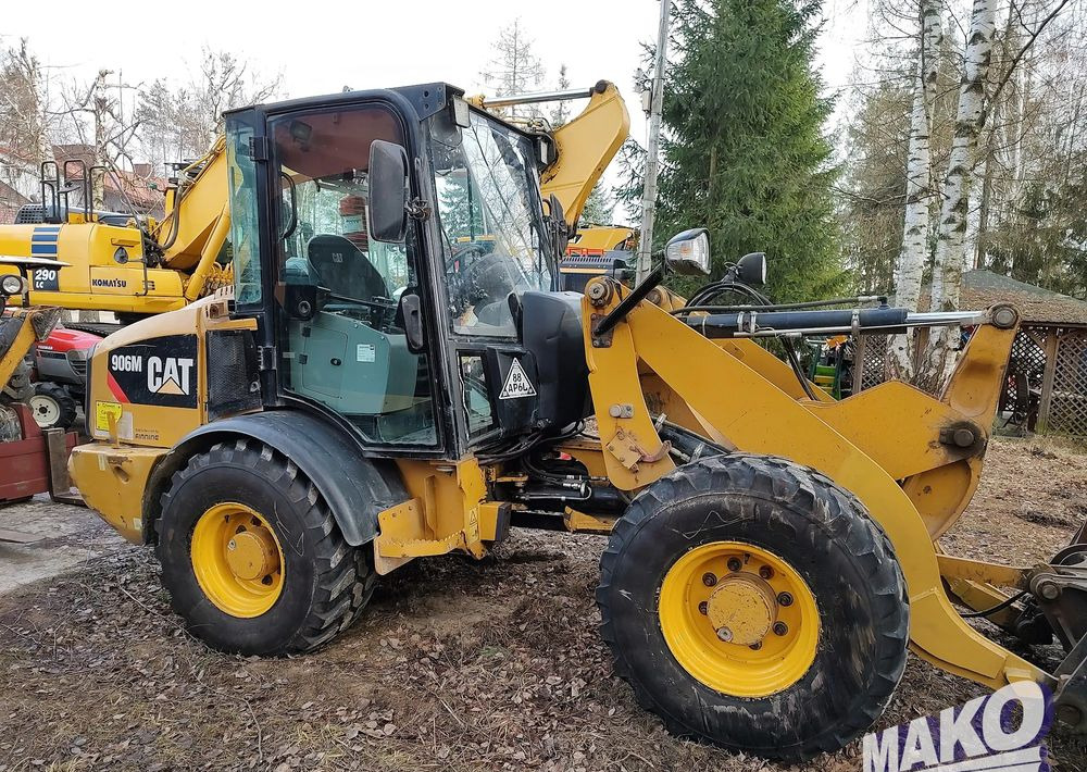 Caterpillar 906M - Máy xúc lật bánh lốp: hình 2 Caterpillar 906M - Máy xúc lật bánh lốp: hình 2