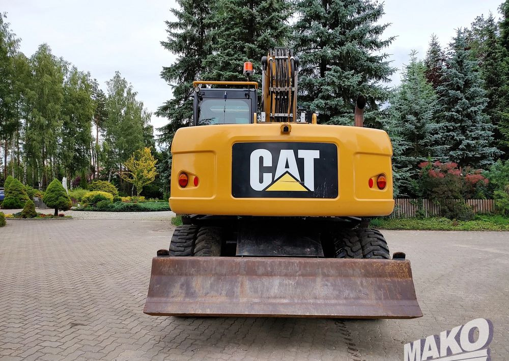 Caterpillar M313D - Máy xúc bánh lốp: hình 3 Caterpillar M313D - Máy xúc bánh lốp: hình 3