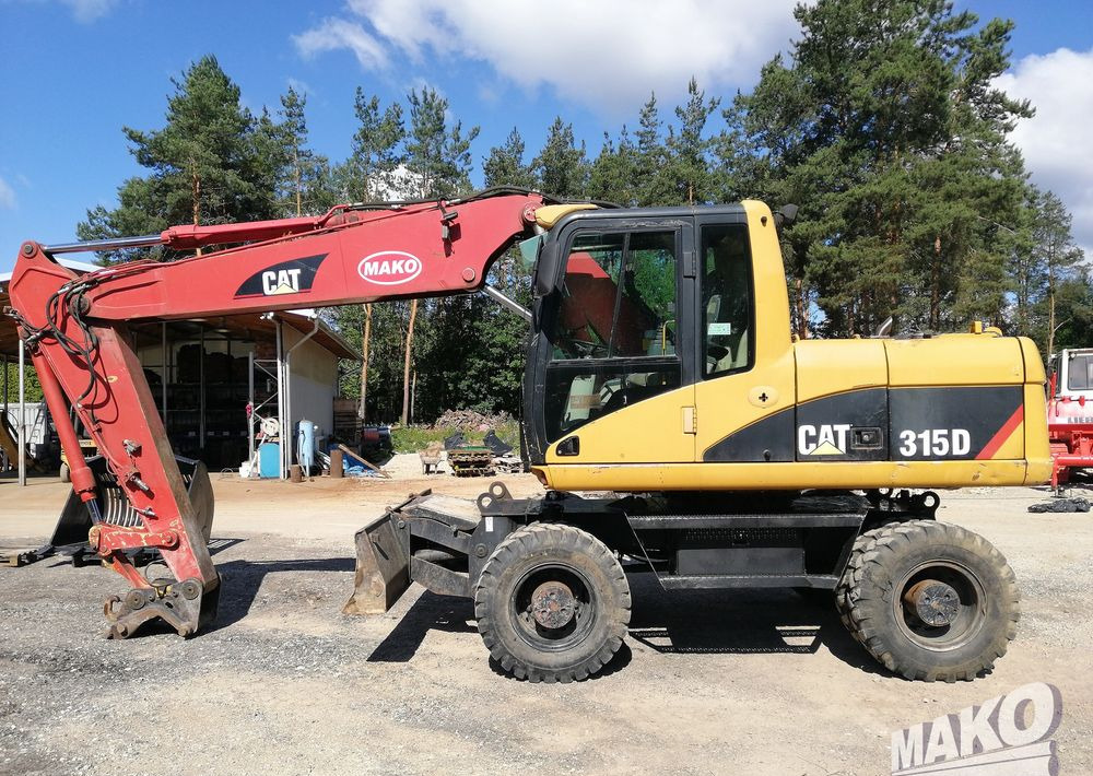 Caterpillar M315 C - Máy xúc bánh lốp: hình 2 Caterpillar M315 C - Máy xúc bánh lốp: hình 2