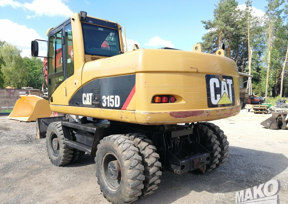 Caterpillar M315 C - Máy xúc bánh lốp: hình 3 Caterpillar M315 C - Máy xúc bánh lốp: hình 3