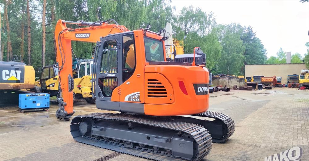 Doosan DX140LCR-5 - Máy xúc bánh xích: hình 2 Doosan DX140LCR-5 - Máy xúc bánh xích: hình 2
