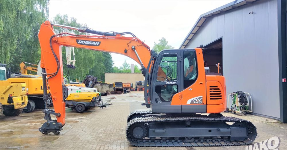 Doosan DX140LCR-5 - Máy xúc bánh xích: hình 1 Doosan DX140LCR-5 - Máy xúc bánh xích: hình 1