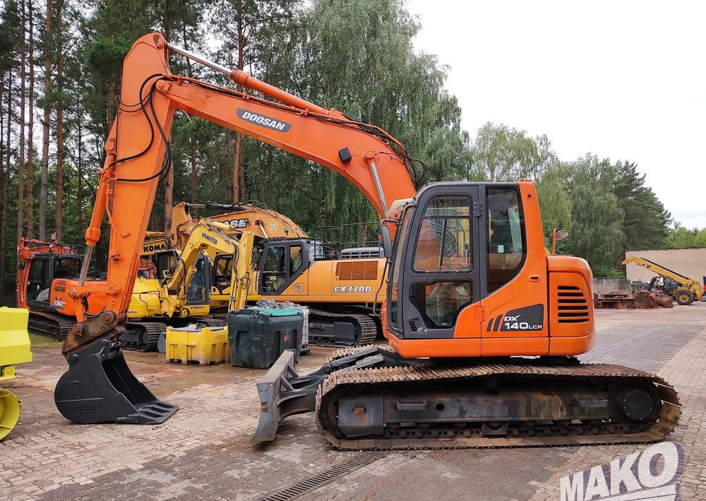 Doosan DX140LCR - Máy xúc bánh xích: hình 1 Doosan DX140LCR - Máy xúc bánh xích: hình 1