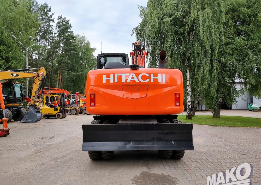 Hitachi ZX 140 - Máy xúc bánh lốp: hình 3 Hitachi ZX 140 - Máy xúc bánh lốp: hình 3