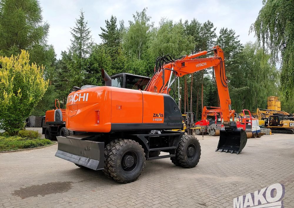 Hitachi ZX 140 - Máy xúc bánh lốp: hình 4 Hitachi ZX 140 - Máy xúc bánh lốp: hình 4
