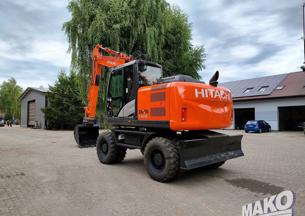 Hitachi ZX 140 - Máy xúc bánh lốp: hình 2 Hitachi ZX 140 - Máy xúc bánh lốp: hình 2