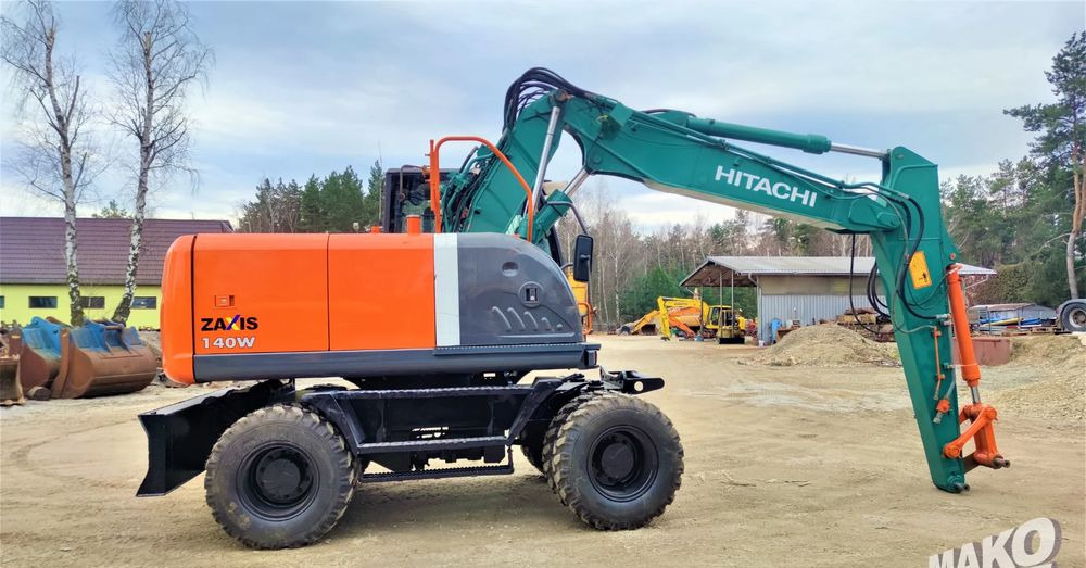 Hitachi ZX140W-3 - Máy xúc bánh lốp: hình 5 Hitachi ZX140W-3 - Máy xúc bánh lốp: hình 5