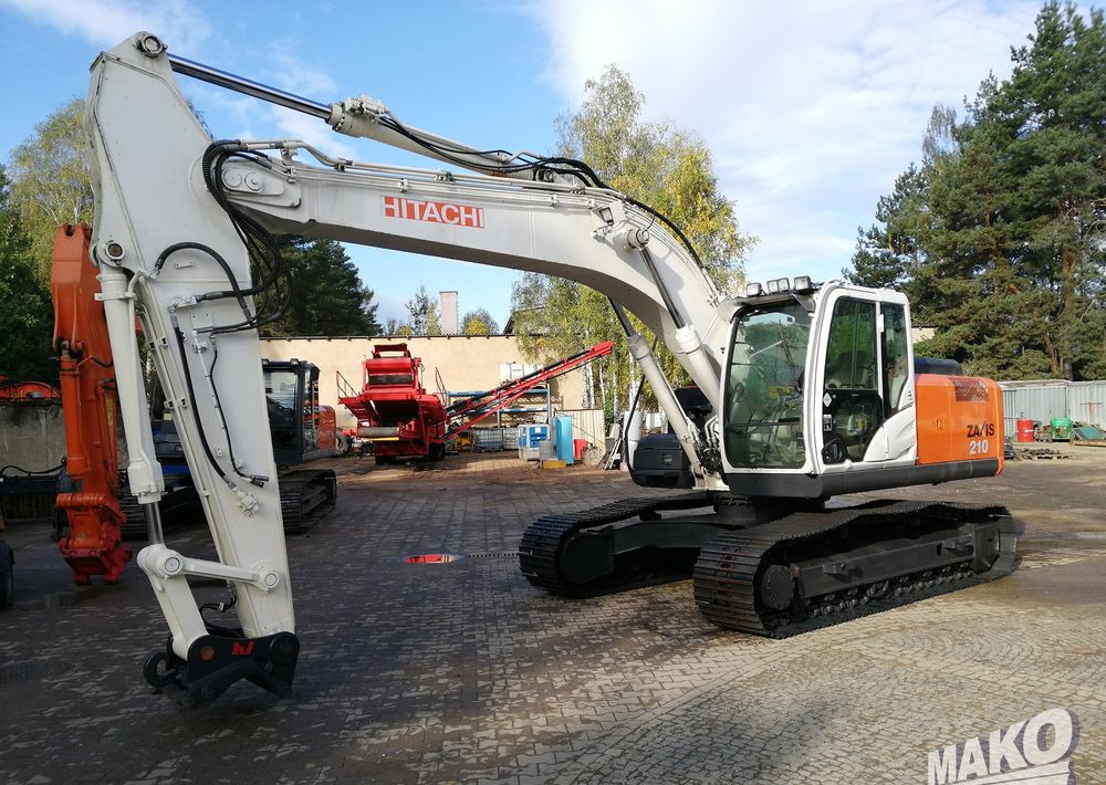 Hitachi ZX210 LC-5B - Máy xúc bánh xích: hình 1 Hitachi ZX210 LC-5B - Máy xúc bánh xích: hình 1