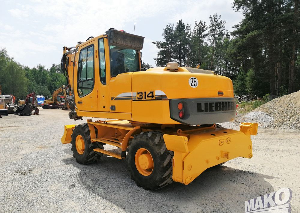 Liebherr A 314 Litronic - Máy xúc bánh lốp: hình 3 Liebherr A 314 Litronic - Máy xúc bánh lốp: hình 3