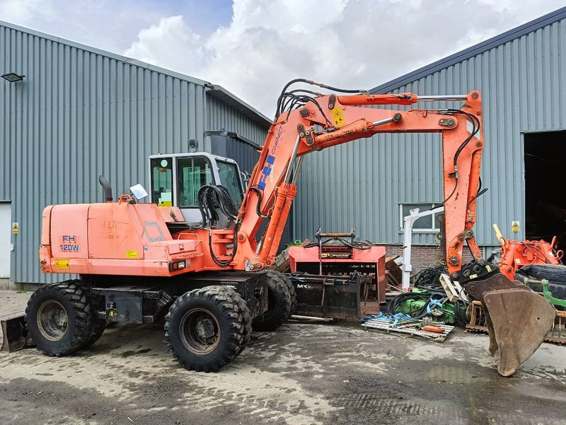 FIAT-HITACHI FH120W bandenkraan Wheel Excavator graafmachine - Máy xúc bánh lốp: hình 1 FIAT-HITACHI FH120W bandenkraan Wheel Excavator graafmachine - Máy xúc bánh lốp: hình 1