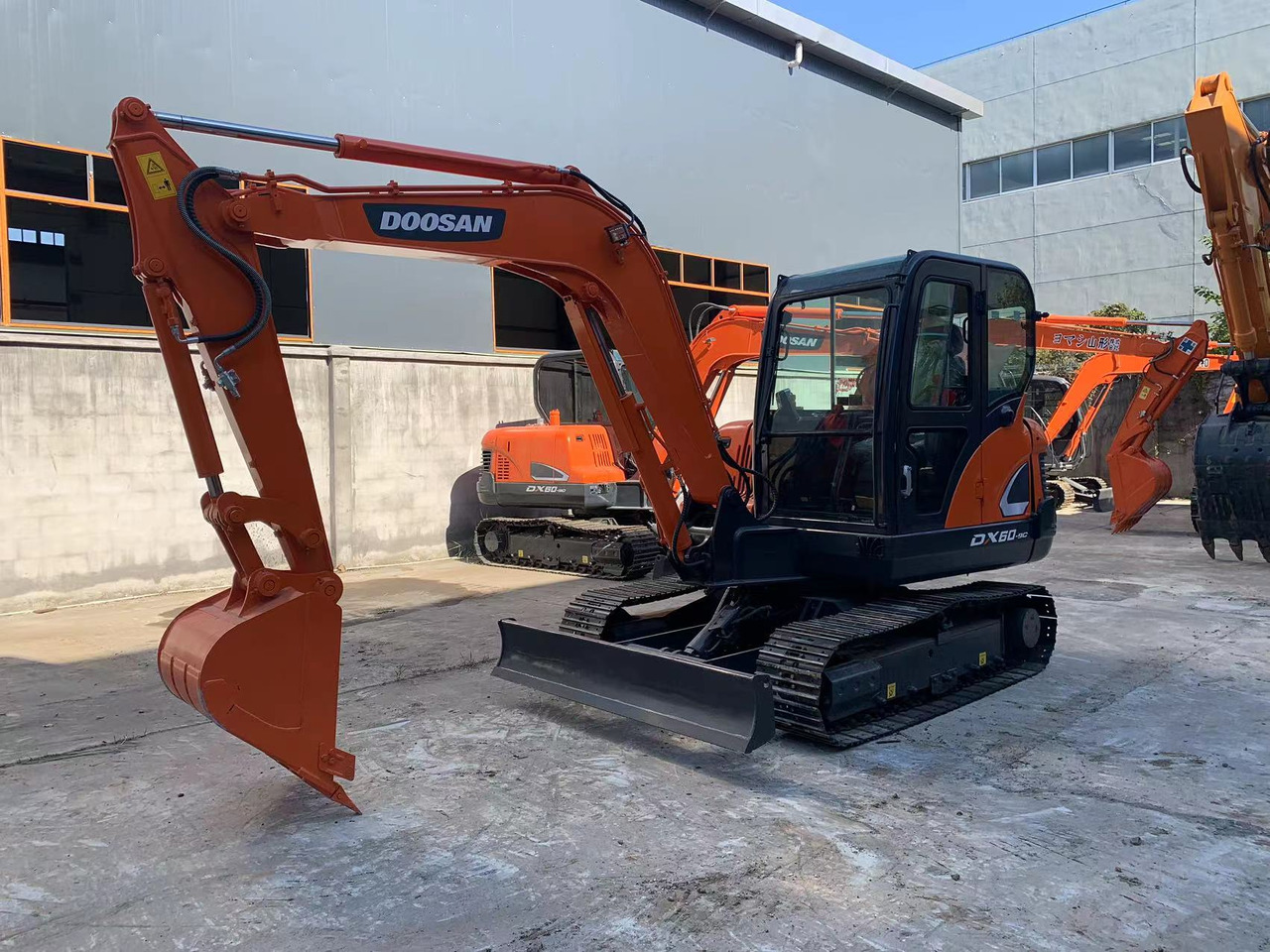 DOOSAN Mini Excavator Doosan DX60, DX55 - Máy xúc bánh xích: hình 4 DOOSAN Mini Excavator Doosan DX60, DX55 - Máy xúc bánh xích: hình 4