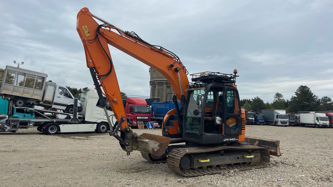 DOOSAN DX140LCR-5 - Máy xúc bánh xích: hình 2 DOOSAN DX140LCR-5 - Máy xúc bánh xích: hình 2