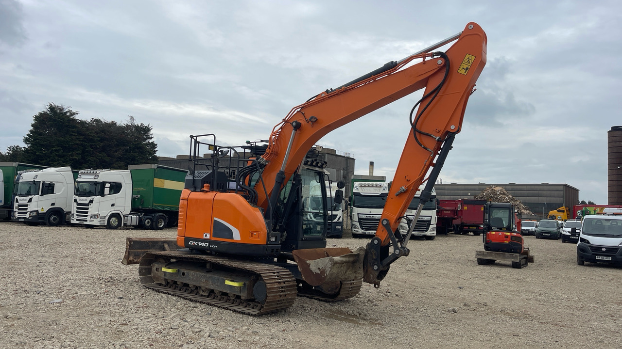 DOOSAN DX140LCR-5 - Máy xúc bánh xích: hình 1 DOOSAN DX140LCR-5 - Máy xúc bánh xích: hình 1