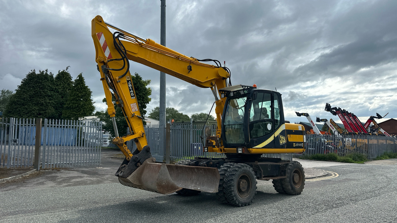 JCB - Máy xúc bánh lốp: hình 2 JCB - Máy xúc bánh lốp: hình 2