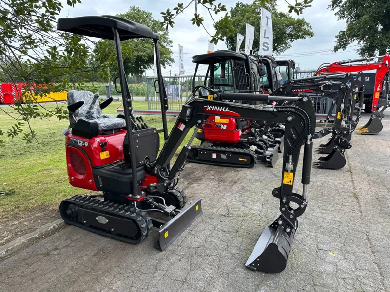 Rhino Rhinoceros XN12-9 - Máy xúc mini: hình 2 Rhino Rhinoceros XN12-9 - Máy xúc mini: hình 2