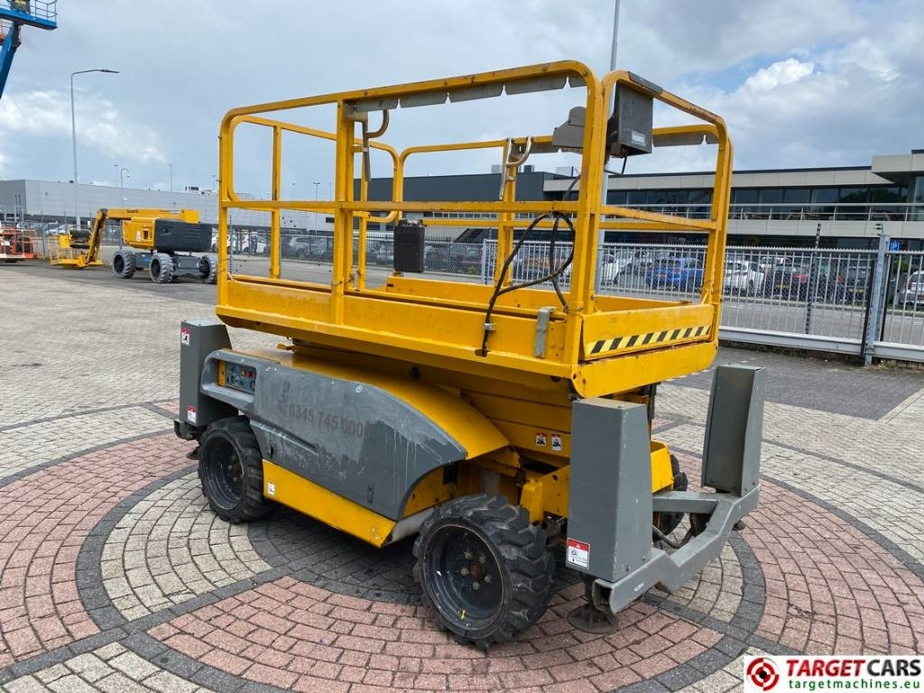 Haulotte Compact 10DX Diesel 4x4 Scissor Work Lift 1015cm - Máy nâng người hình kéo: hình 2 Haulotte Compact 10DX Diesel 4x4 Scissor Work Lift 1015cm - Máy nâng người hình kéo: hình 2