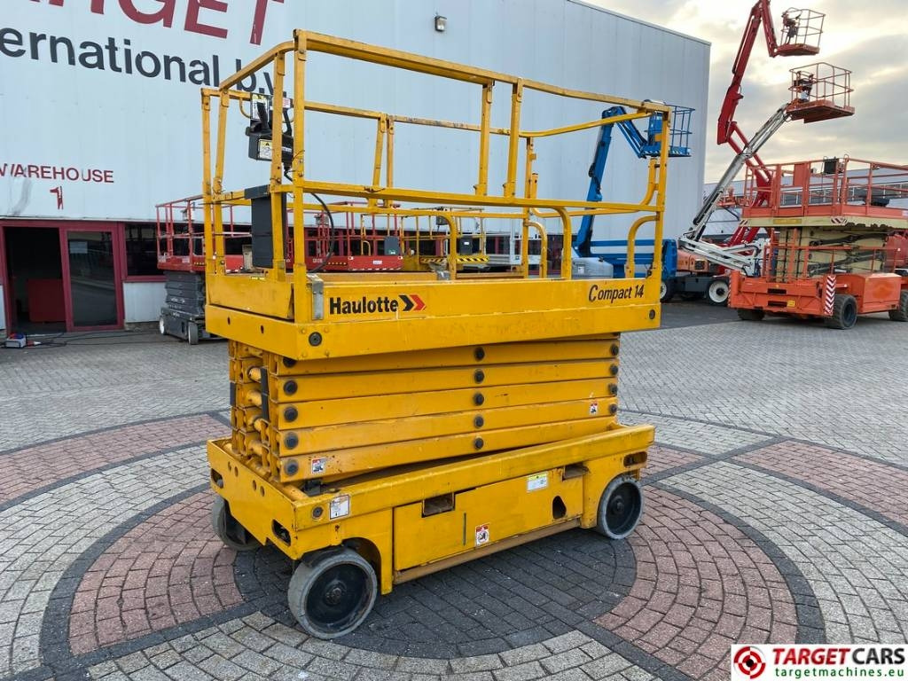 Haulotte Compact 14 Electric Scissor Work Lift 1385cm - Máy nâng người hình kéo: hình 1 Haulotte Compact 14 Electric Scissor Work Lift 1385cm - Máy nâng người hình kéo: hình 1