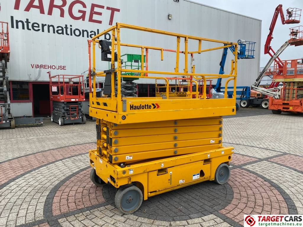 Haulotte Compact 14 Electric Scissor Work Lift 1385cm - Máy nâng người hình kéo: hình 1 Haulotte Compact 14 Electric Scissor Work Lift 1385cm - Máy nâng người hình kéo: hình 1