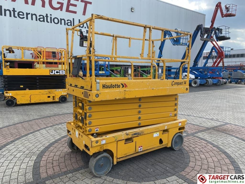 Haulotte Compact 14 Electric Scissor Work Lift 1385cm - Máy nâng người hình kéo: hình 1 Haulotte Compact 14 Electric Scissor Work Lift 1385cm - Máy nâng người hình kéo: hình 1