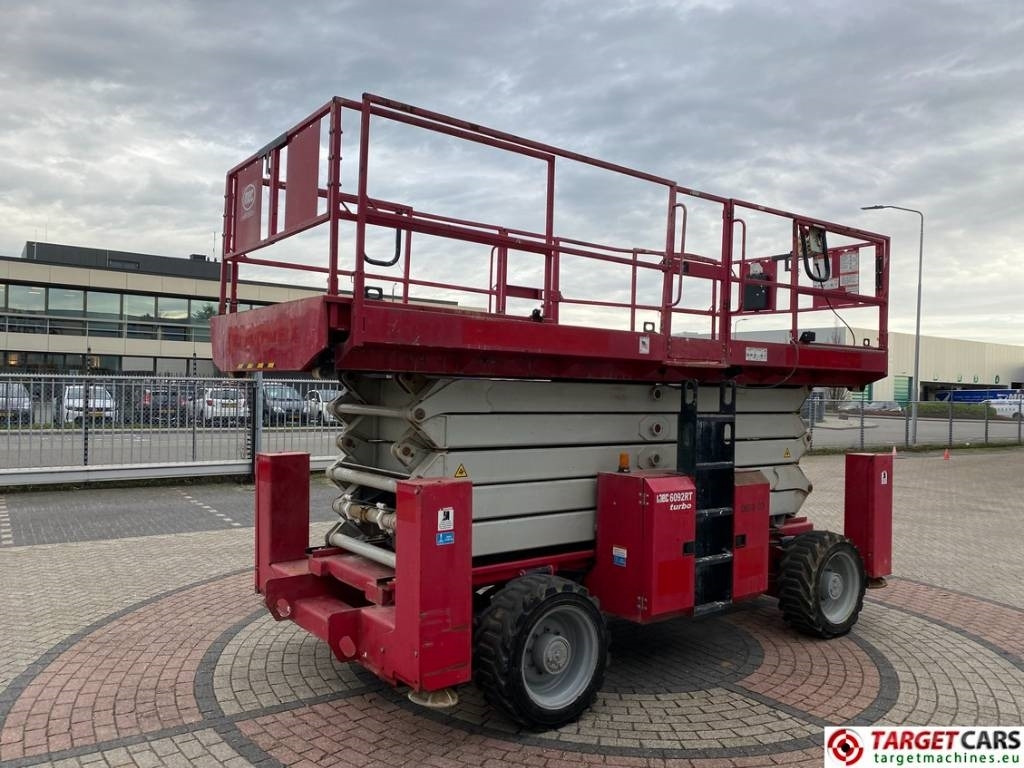 MEC 6092RT Diesel 4x4 Scissor Work Lift 2020cm - Máy nâng người hình kéo: hình 3 MEC 6092RT Diesel 4x4 Scissor Work Lift 2020cm - Máy nâng người hình kéo: hình 3