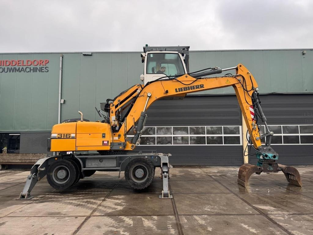 Liebherr A 316 - Máy cạp rác/ Công nghiệp: hình 3 Liebherr A 316 - Máy cạp rác/ Công nghiệp: hình 3