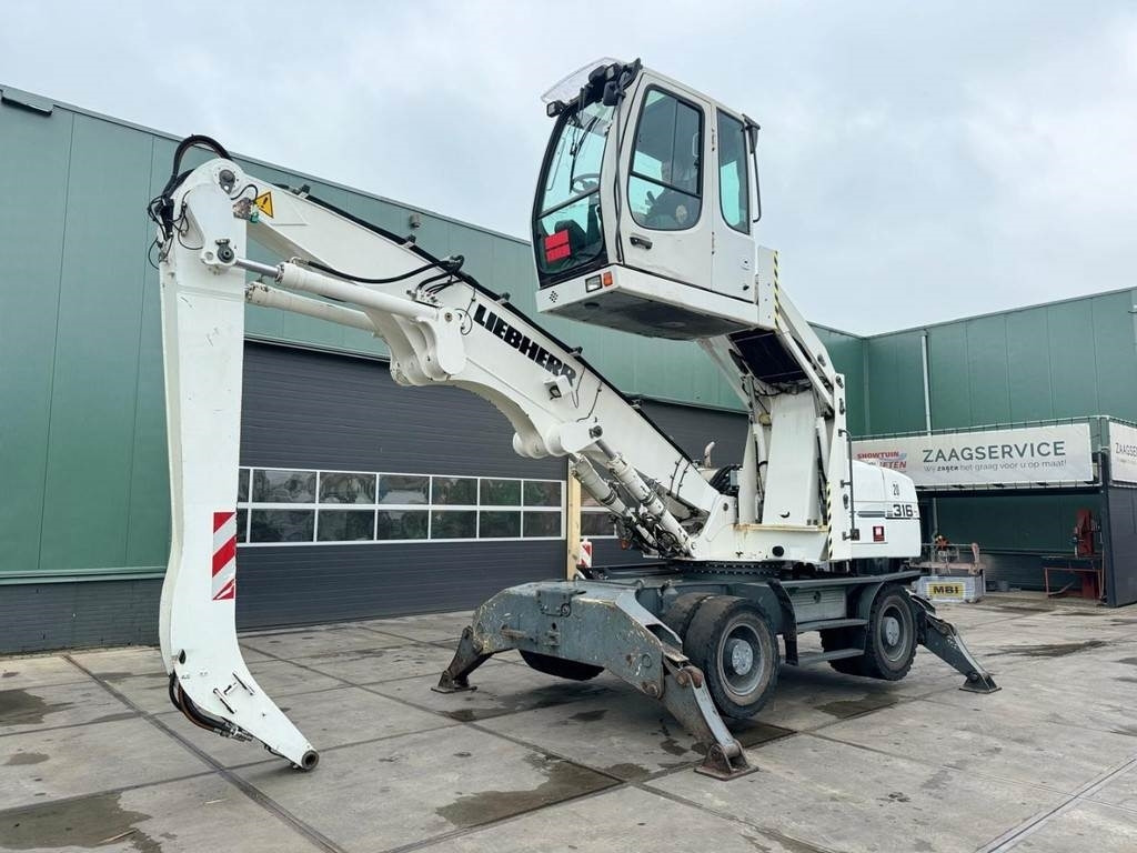 Liebherr A 316 - Máy cạp rác/ Công nghiệp: hình 2 Liebherr A 316 - Máy cạp rác/ Công nghiệp: hình 2