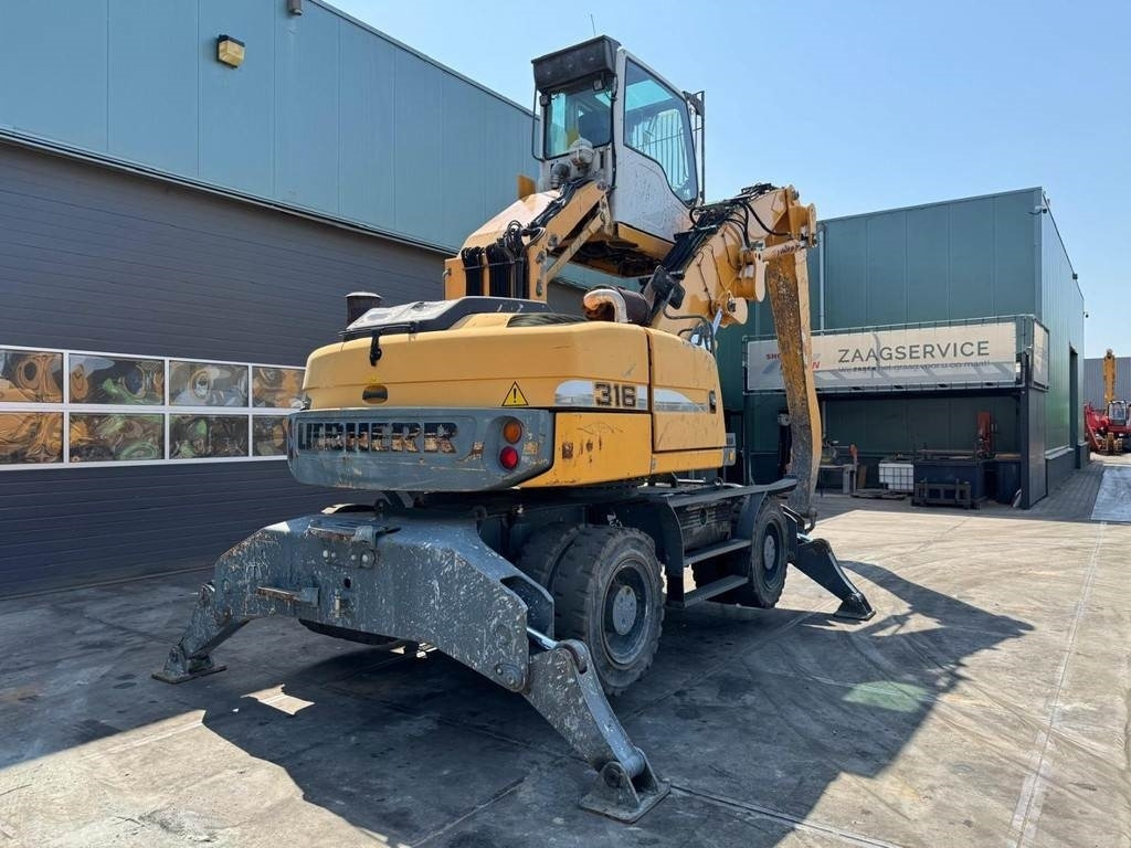 Liebherr A 316 - Máy cạp rác/ Công nghiệp: hình 4 Liebherr A 316 - Máy cạp rác/ Công nghiệp: hình 4