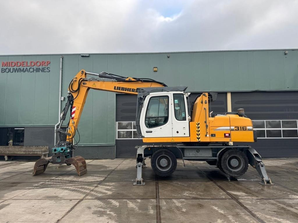 Liebherr A 316 - Máy cạp rác/ Công nghiệp: hình 5 Liebherr A 316 - Máy cạp rác/ Công nghiệp: hình 5