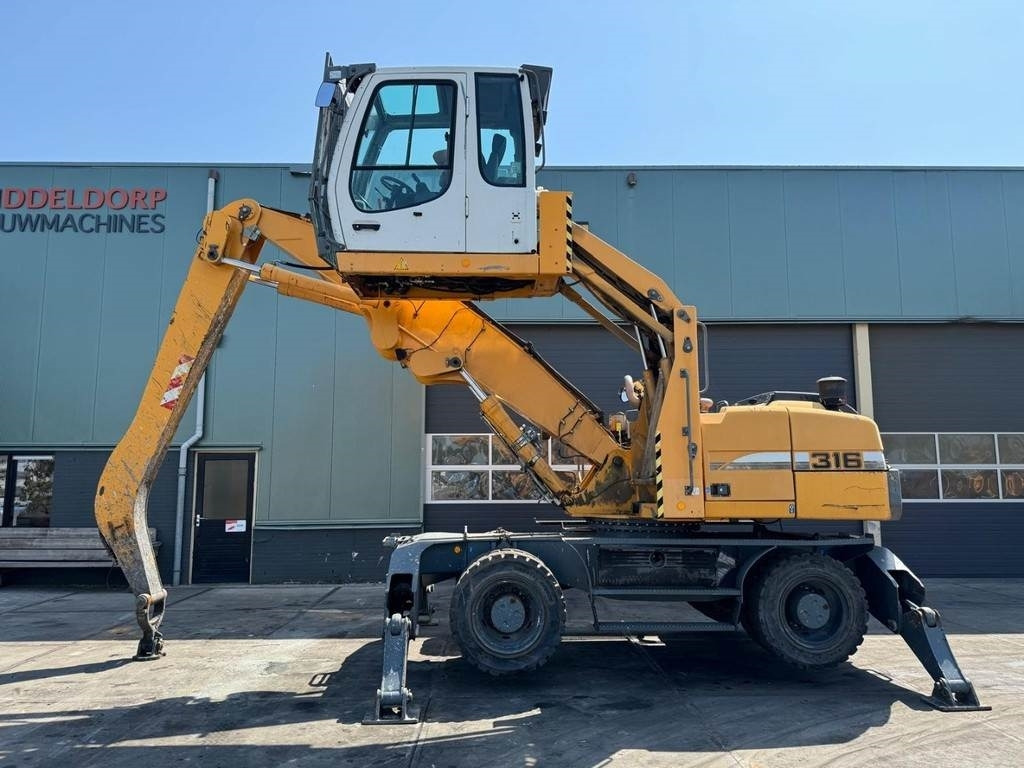 Liebherr A 316 - Máy cạp rác/ Công nghiệp: hình 1 Liebherr A 316 - Máy cạp rác/ Công nghiệp: hình 1