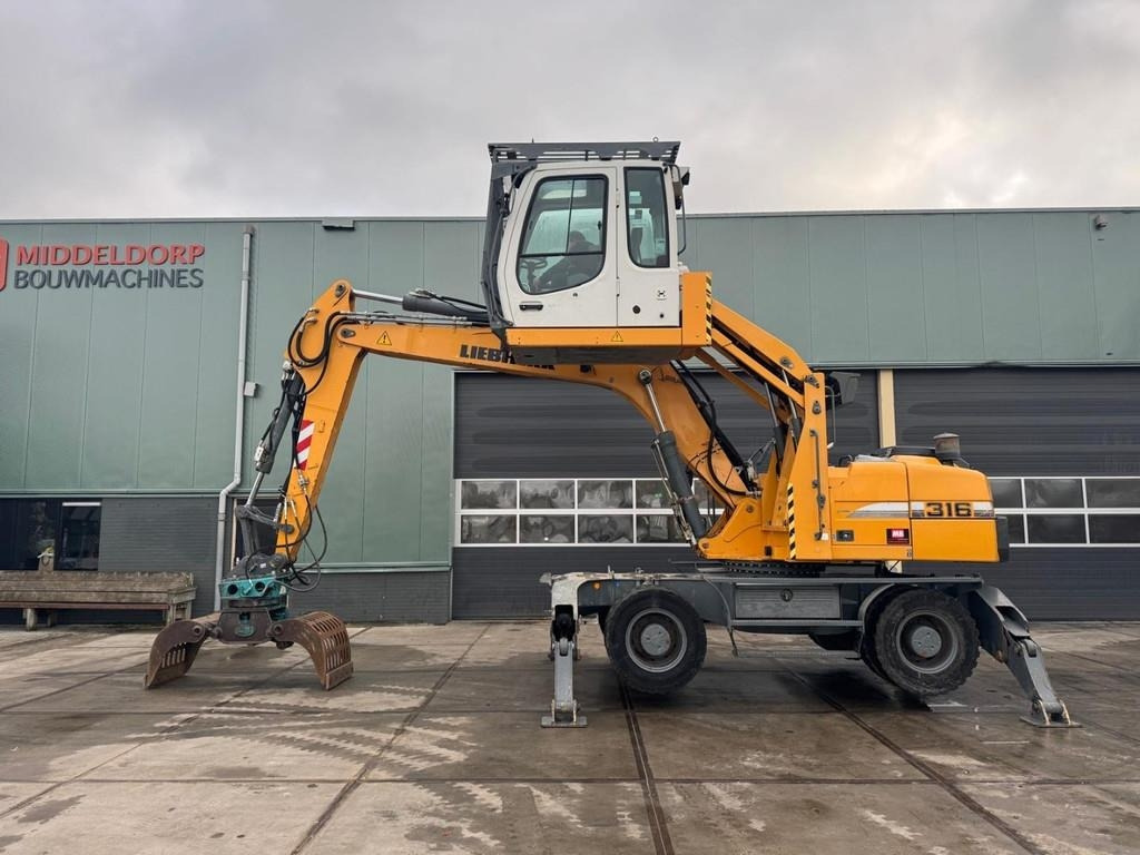 Liebherr A 316 - Máy cạp rác/ Công nghiệp: hình 1 Liebherr A 316 - Máy cạp rác/ Công nghiệp: hình 1