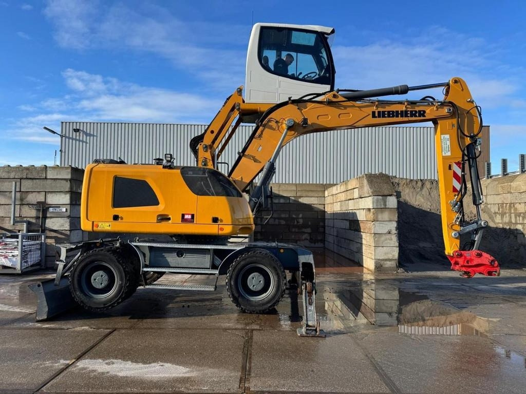 Liebherr LH 18 M - Máy cạp rác/ Công nghiệp: hình 5 Liebherr LH 18 M - Máy cạp rác/ Công nghiệp: hình 5