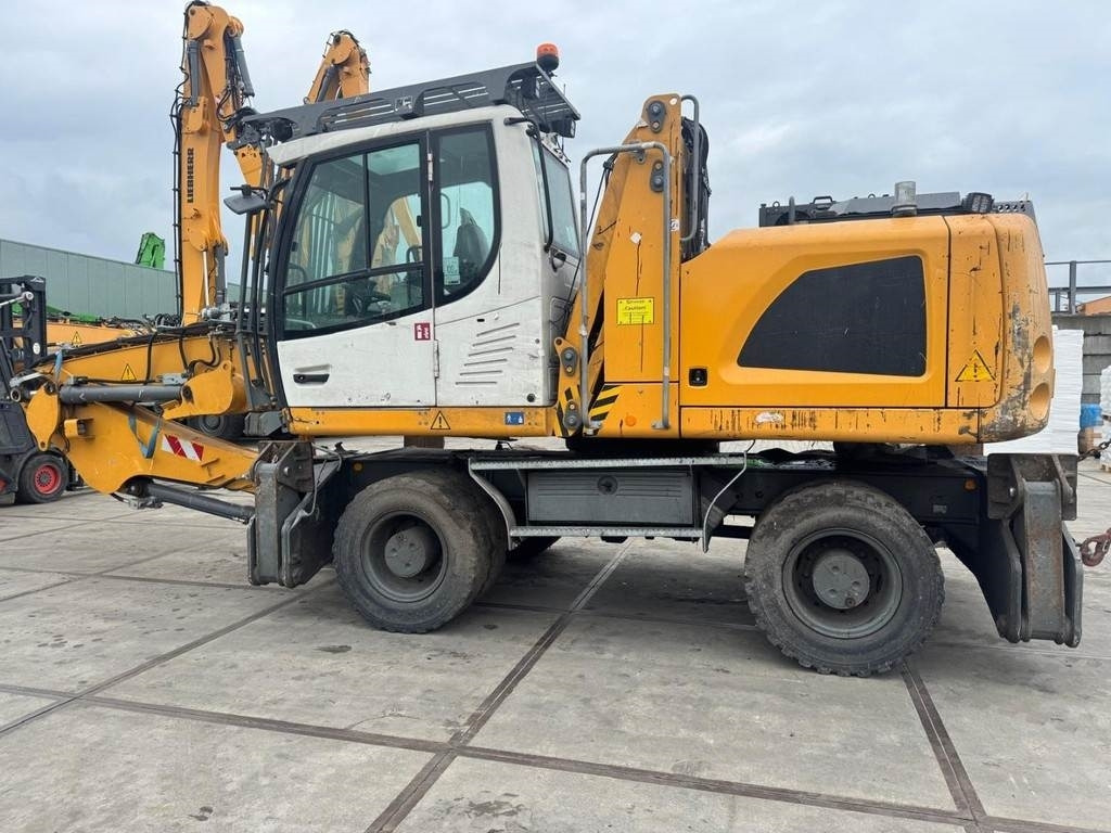 Liebherr LH 22 M - Máy cạp rác/ Công nghiệp: hình 3 Liebherr LH 22 M - Máy cạp rác/ Công nghiệp: hình 3