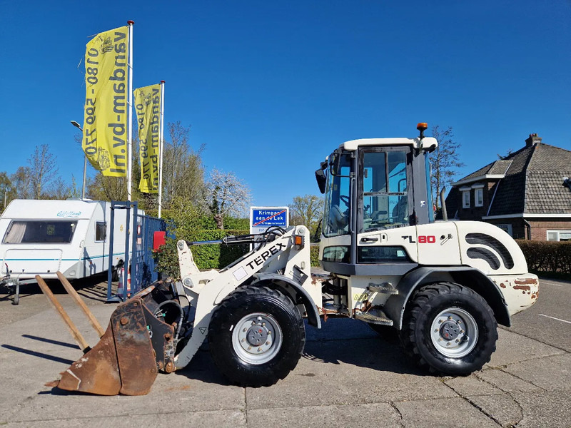 Terex TL80 palletvorken en 4in1-bak - Máy xúc lật bánh lốp: hình 1 Terex TL80 palletvorken en 4in1-bak - Máy xúc lật bánh lốp: hình 1