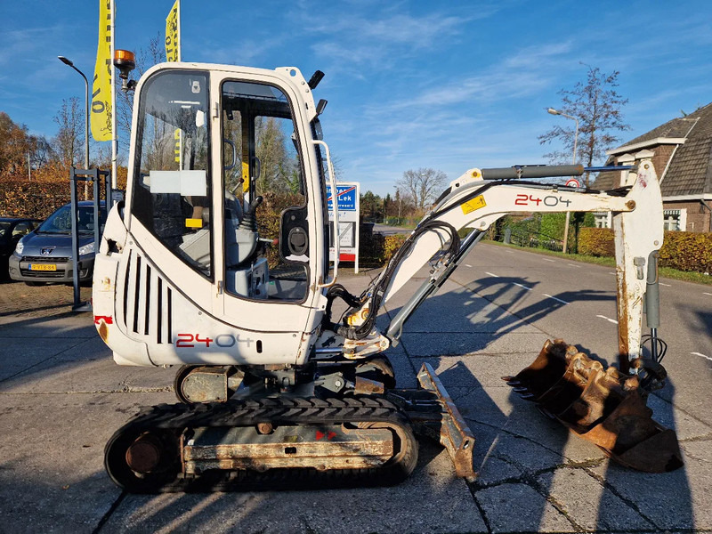 Máy xúc mini WACKER NEUSON 2404RD kan op een (berg)helling draaien: hình 20