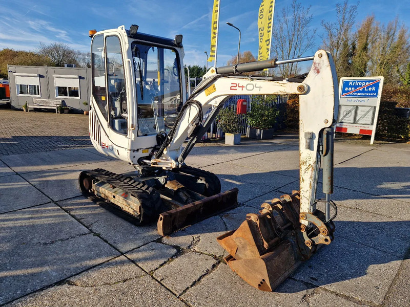 Máy xúc mini WACKER NEUSON 2404RD kan op een (berg)helling draaien: hình 6