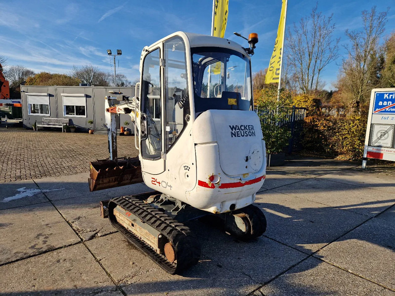 Máy xúc mini WACKER NEUSON 2404RD kan op een (berg)helling draaien: hình 7