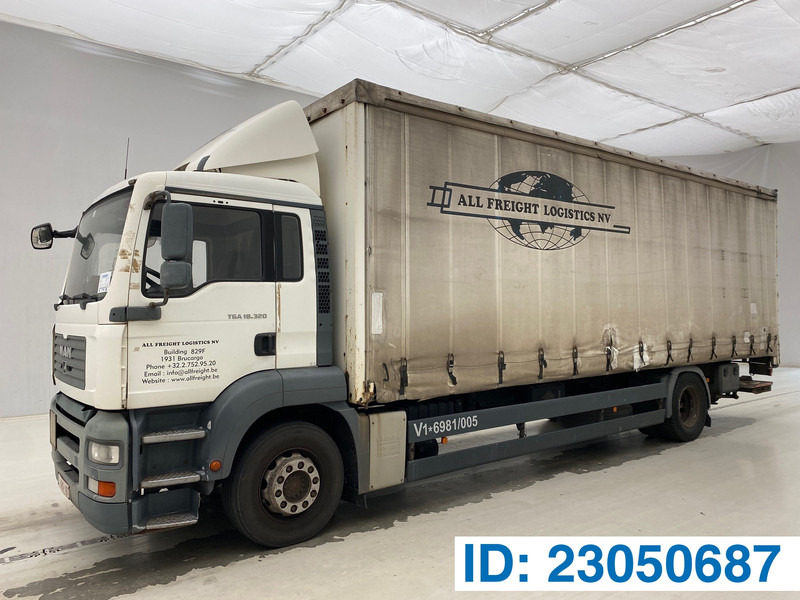 MAN TGA 18.320 - Xe tải thùng mui bạt: hình 1 MAN TGA 18.320 - Xe tải thùng mui bạt: hình 1